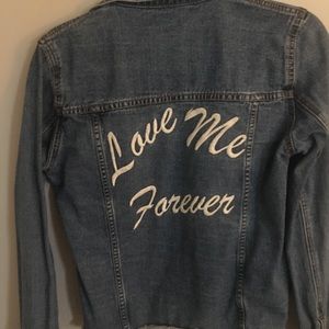 Denim jacket with embroidered letters